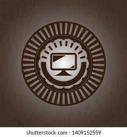 monitor icon inside retro wood emblem
