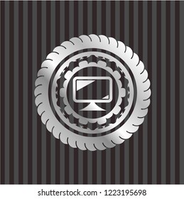 monitor icon inside silver shiny emblem