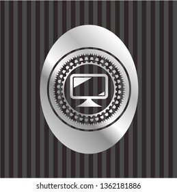 monitor icon inside silver shiny emblem
