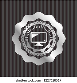 monitor icon inside silvery badge or emblem