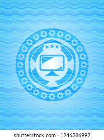 monitor icon inside water wave representation emblem.