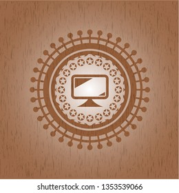 monitor icon inside wood emblem. Vintage.