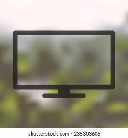 monitor icon on blurred background