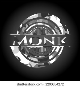 Monk on grey camo texture