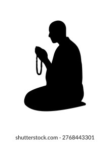 Monk silhouette sits on the floor, hands clasped, and holds a string of beads. They appear focused and calm. The setting is simple and invites reflection.