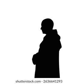 Monk silhouette standing profile peaceful contemplation.