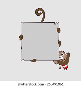 Monkey clings to scroll legs and trying not to fall