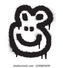 Monkey face emoticon with black spray paint