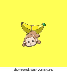 monkey hanging on a banana