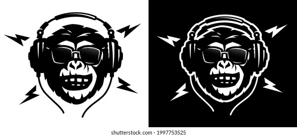 Monkey head with headphones and sunglasses on a light and dark background.