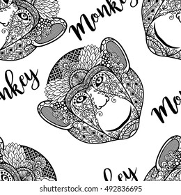 Monkey head seamless pattern with colorful ethnic motifs. Vector illustration