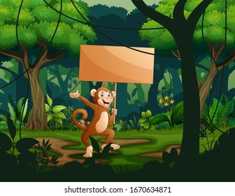 A monkey holding an empty wooden sign board in the forest