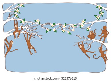 The monkey pals are playing in the top of the tree. 