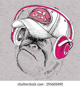 Monkey portrait in cap and with headphones. Vector illustration.