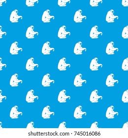 Monkey sitting pattern repeat seamless in blue color for any design. Vector geometric illustration
