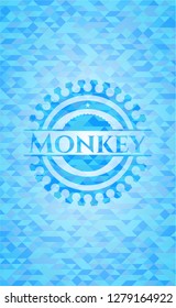 Monkey sky blue emblem with triangle mosaic background