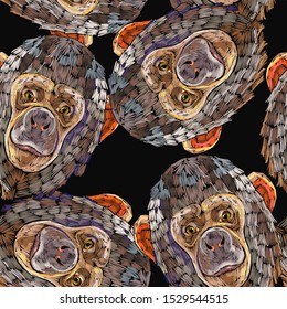 Monkeys. Jungle template of clothes, tapestry, t-shirt design. Chimpanzee heads seamless pattern. Embroidery art