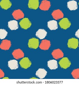Mono print style circles seamless vector pattern background. Textured stamp effect orange, green, white groups of round shapes on blue backdrop. Hand crafted design. All over print for summer concept