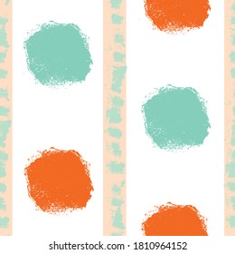Mono print style circles seamless vector pattern background. Textured stamp effect orange, mint green round shapes and vertical stripes on white backdrop. Painterly all over print for summer concept