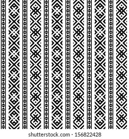 monochromatic ethnic seamless background. vertical textures in black and white colors 