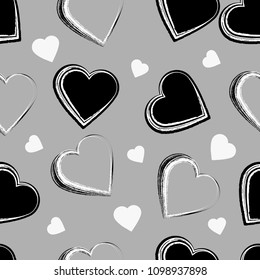 Monochromatic rough brush texture grungy hearts seamless pattern design 