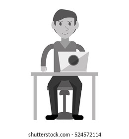 monochromatic young man using laptop on desk