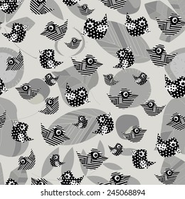 Monochromaticity composition of birds and leaves on a gray background. Seamless.