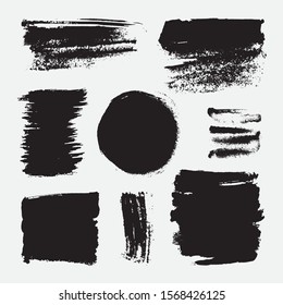 Monochrome abstract vector grunge textures. Set of hand drawn paint brush strokes and stains.