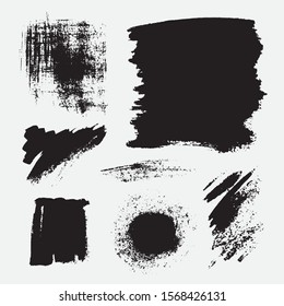 Monochrome abstract vector grunge textures. Set of hand drawn paint brush strokes and stains.