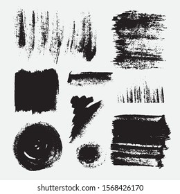 Monochrome abstract vector grunge textures. Set of hand drawn paint brush strokes and stains.