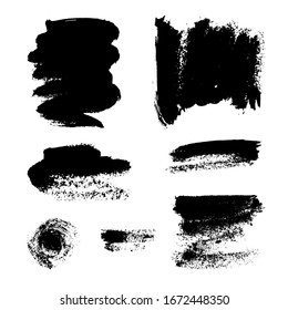 Monochrome abstract vector grunge textures. Set of hand drawn paint brush strokes and stains.