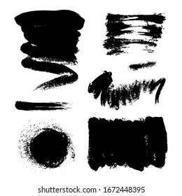 Monochrome abstract vector grunge textures. Set of hand drawn paint brush strokes and stains.