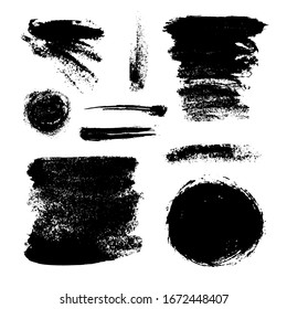 Monochrome abstract vector grunge textures. Set of hand drawn paint brush strokes and stains.