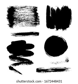 Monochrome abstract vector grunge textures. Set of hand drawn paint brush strokes and stains.