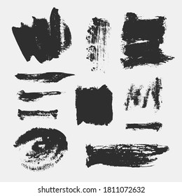 Monochrome abstrakte Vektorgrunge-Texturen. Set von handgezeichneten Pinselstrichen und -flecken.
