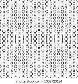 Monochrome background with randomly disposed circles. Vector seamless pattern. Simple texture from different circles. Black and white color. Contemporary graphic design. Repeating abstract background 