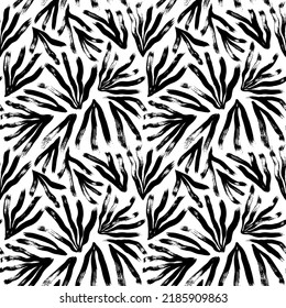 Monochrome botanical seamless pattern with long tropical leaves. Jungle simple black and white ornament. Handdrawn plant elements painted with a brush. Nature ornament for fabric, wrapping and textile