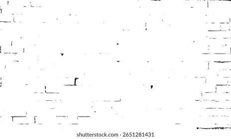 a monochrome brick wall image showing distressed texture and high contrast details in black and white tones