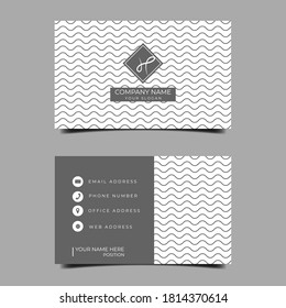 Monochrome business card template. Business card design with Grey color and wave line ornament. Usable for craft and art business.