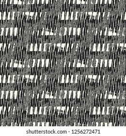 Monochrome Dashed Variegated Stroke Textured Distressed Background. Seamless Pattern.