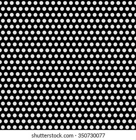 Monochrome dotted background. Repeatable, seamless circle pattern.