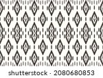 Monochrome dyed effect tribal diamond background designs and Ikat dyeing technique. Seamless vector design.