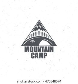 Monochrome emblem with the wood, tent and the mountain, for travel and the campground