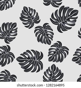 Monochrome exotic seamless pattern with tropical leaves. Black and white leaves. Floral background.