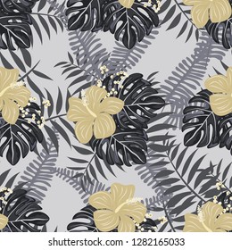 Monochrome exotic seamless pattern with tropical flowers and leaves. Hibiscus flowers.