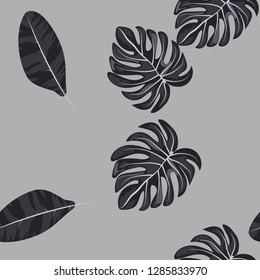 Monochrome exotic seamless pattern with tropical leaves. Black and white leaves. Floral background.