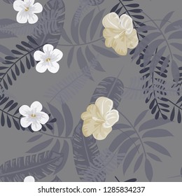 Monochrome exotic seamless pattern with tropical flowers and leaves. Hibiscus flowers.