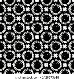 Monochrome geometric pattern with circles and crosses. Abstract hand drawn seamless vector pattern with geometric shapes.