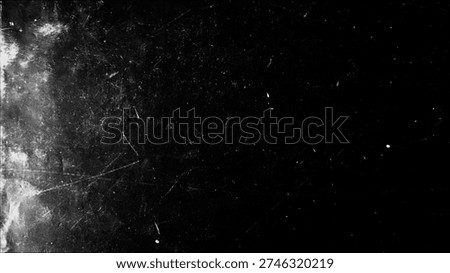 Monochrome horizontal grunge background featuring scratches, abrasions, and paint splashes from an artist's studio in a vintage setting.