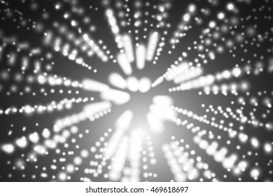 Monochrome image with highlights. Traffic light. The flow of light.